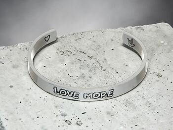 Silvertone Love More Cuff Bracelet